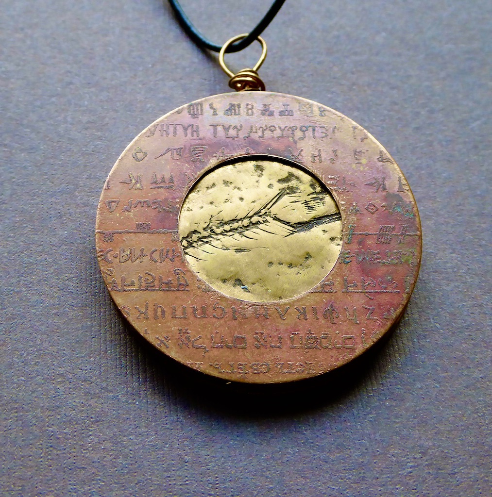 Fossil Skeleton Reversible Pendant