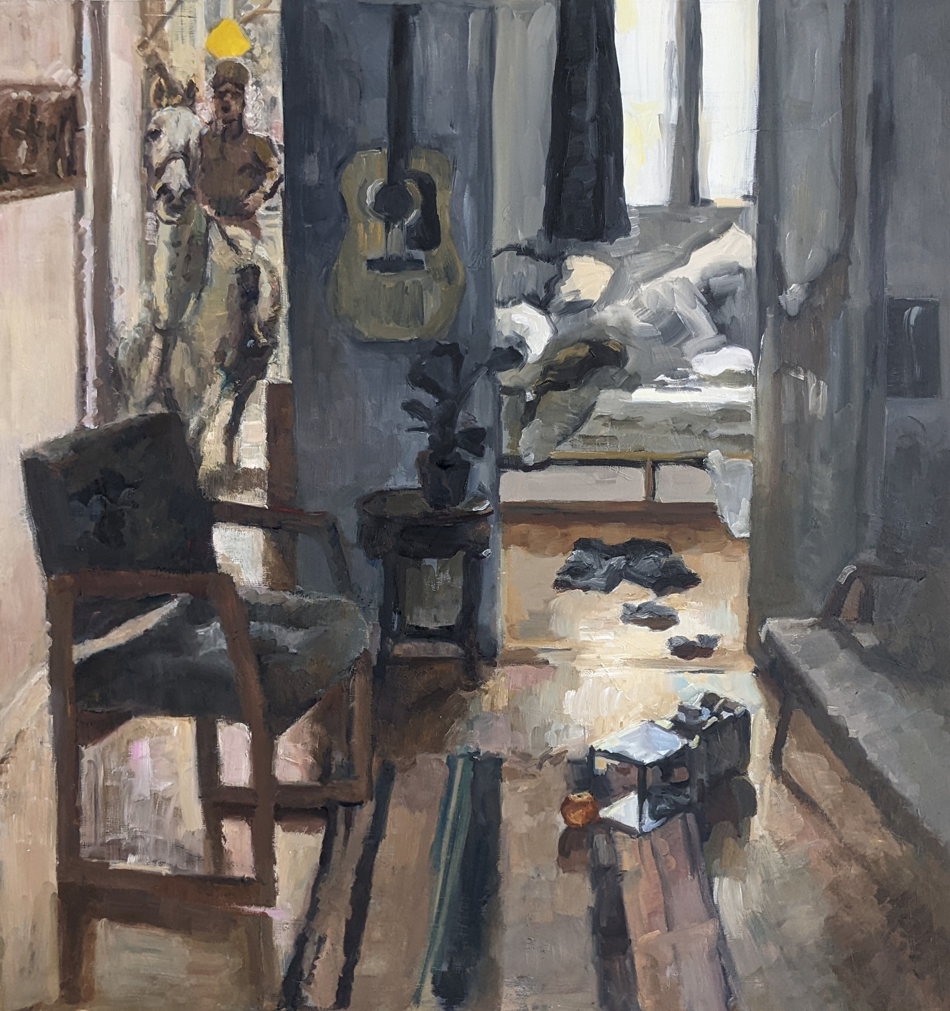 A disheveled interior scene.  There's a candy machine on the floor with orange coming out of it.  A man on horseback riding through the front door.