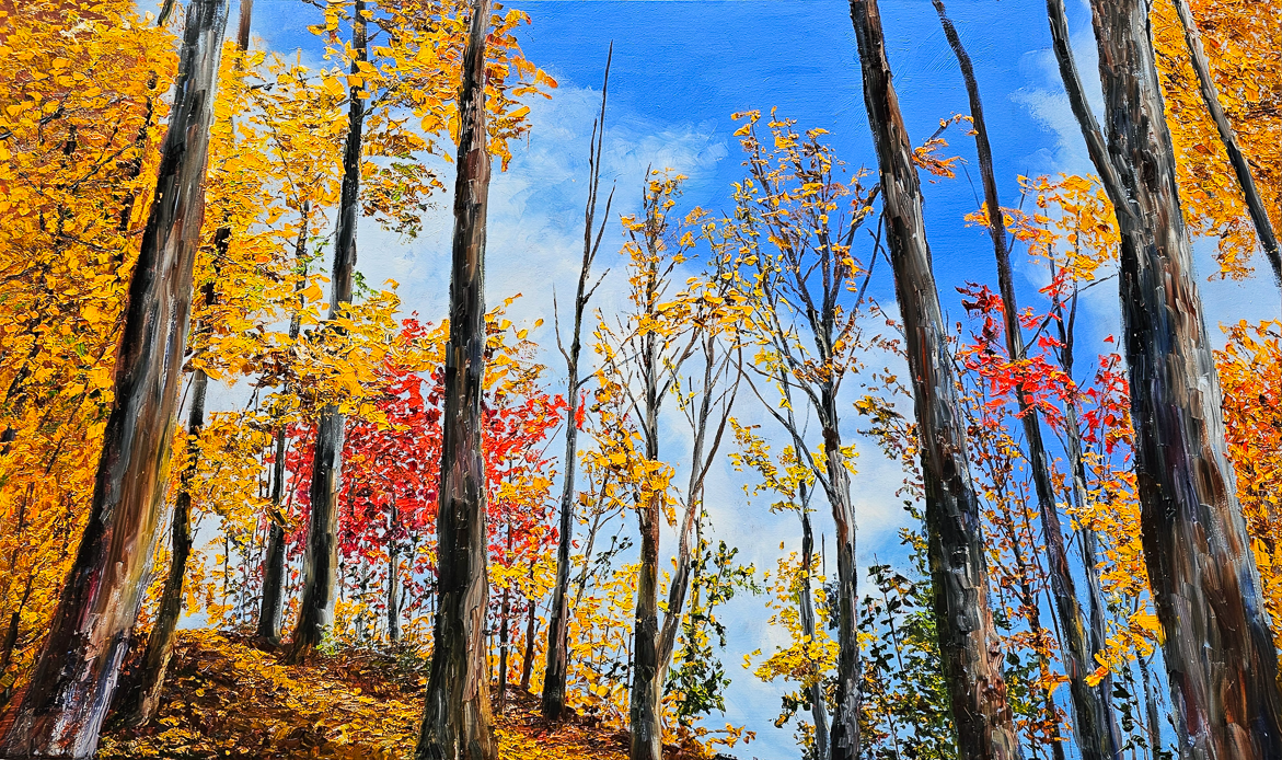 A landscape oil painting of looking up on a hillside path with tall trees that have yellow, orange or red leaves and a cloudy blue sky. This large decor is a great accent in the home or office.