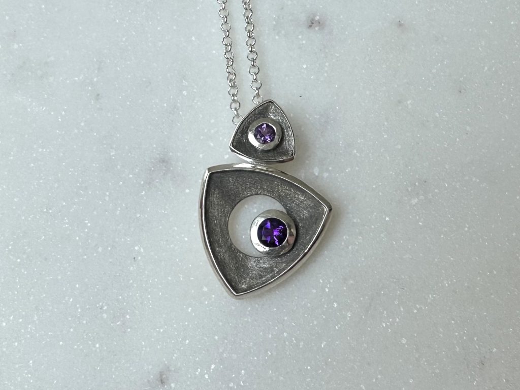 Double triangle pendant