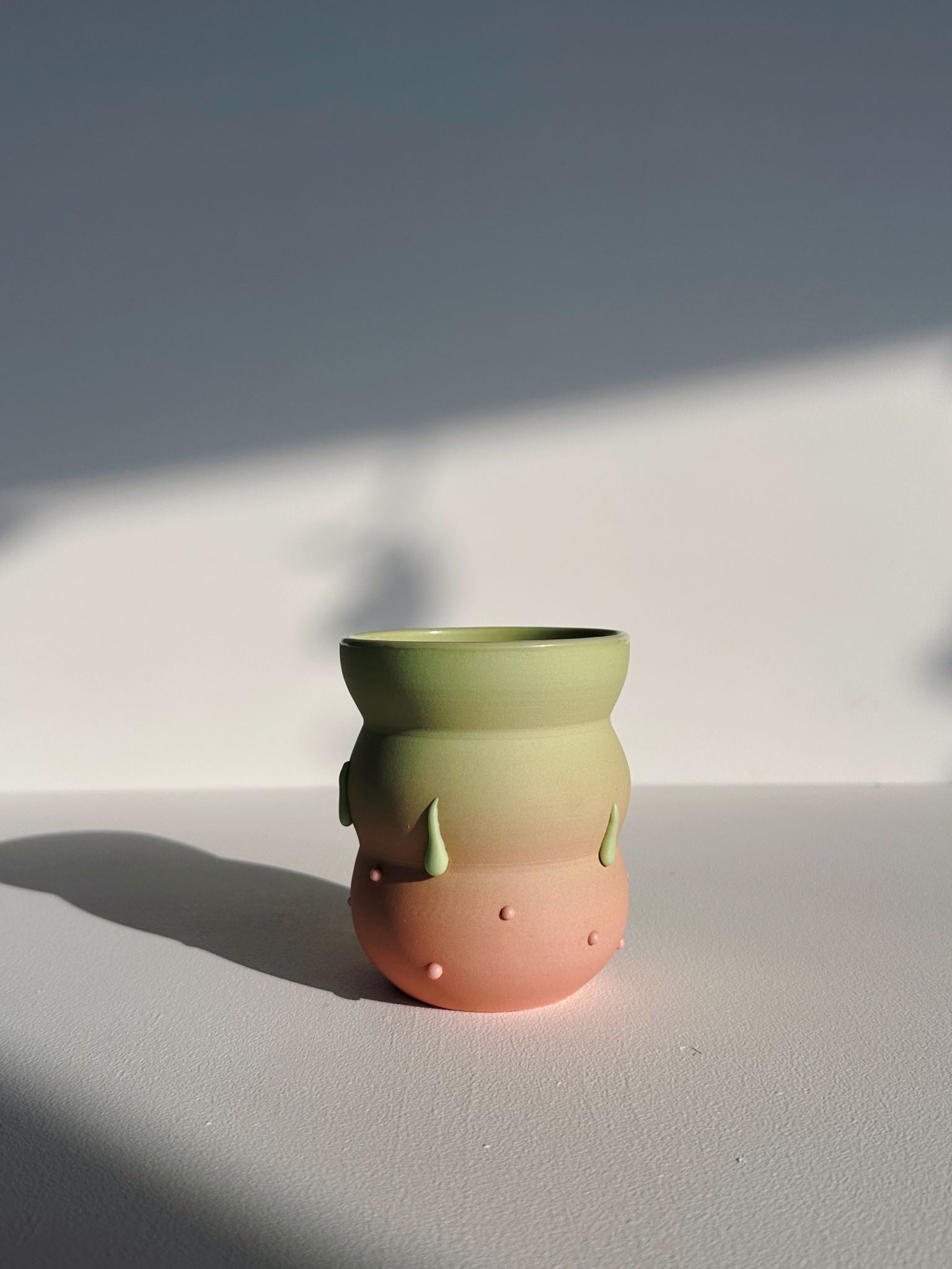 Green and pink tumbler