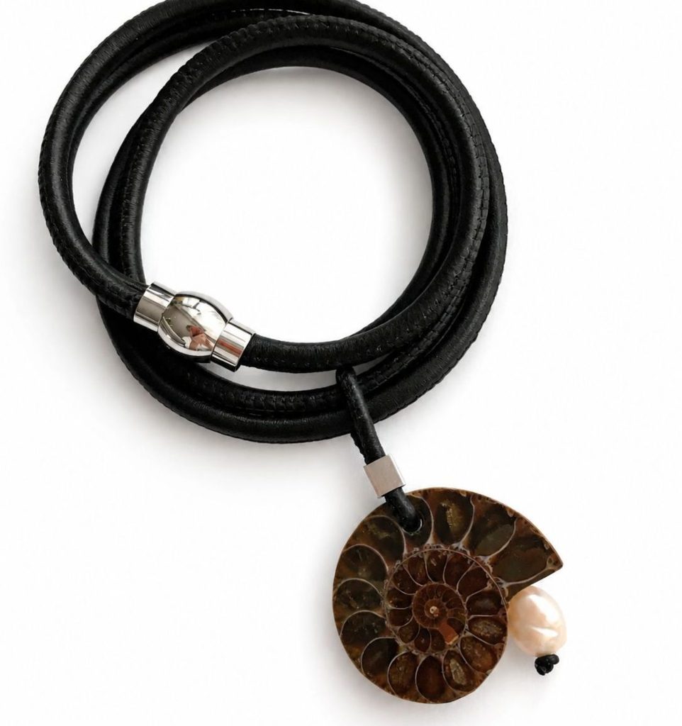 Contemporary naturalist necklace with Ammonite fossil and freshwater pearl