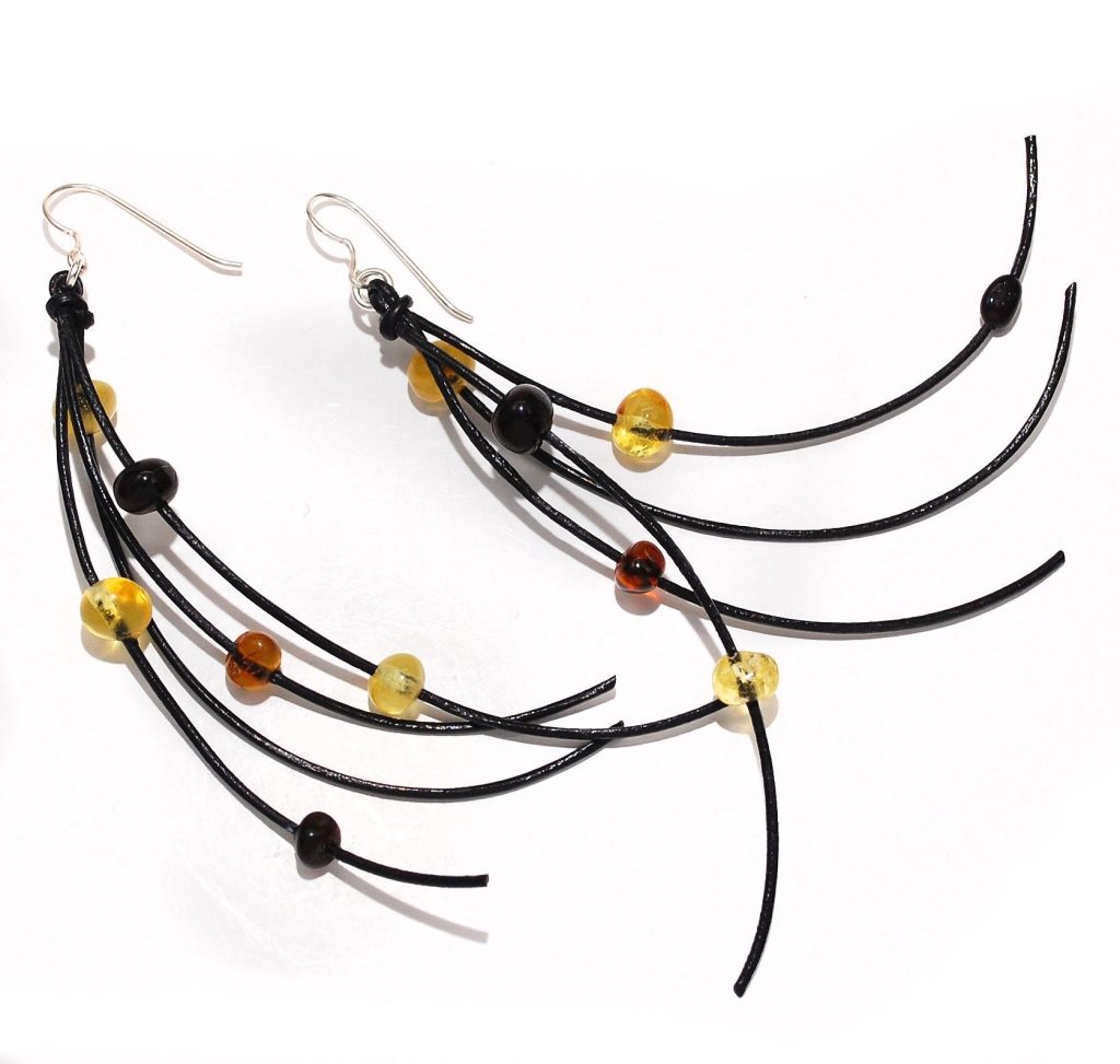 Sterling silver statement earrings with leather and natural amber