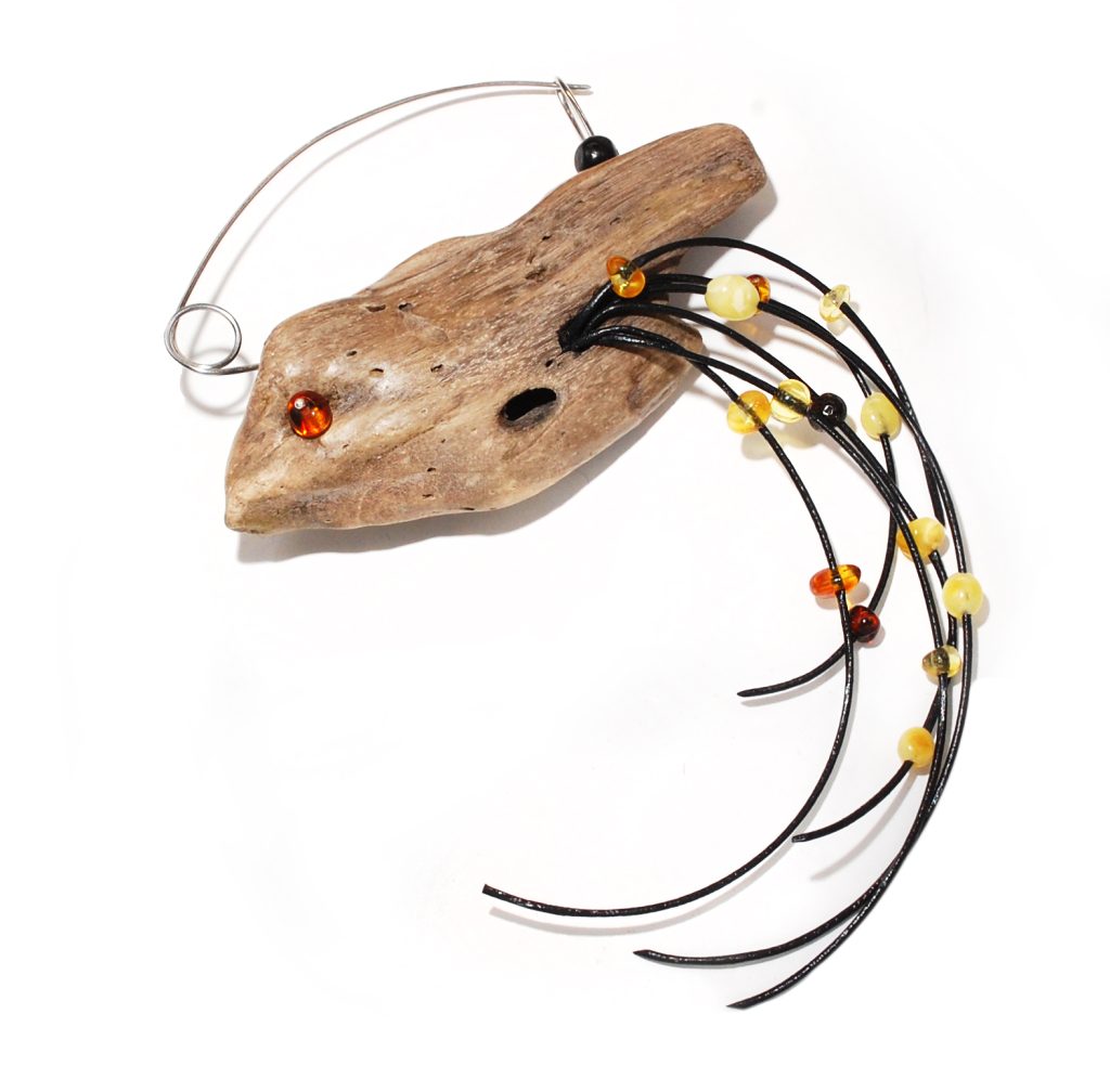 Driftwood brooch with tiny Amber beads in the shape of a bird
